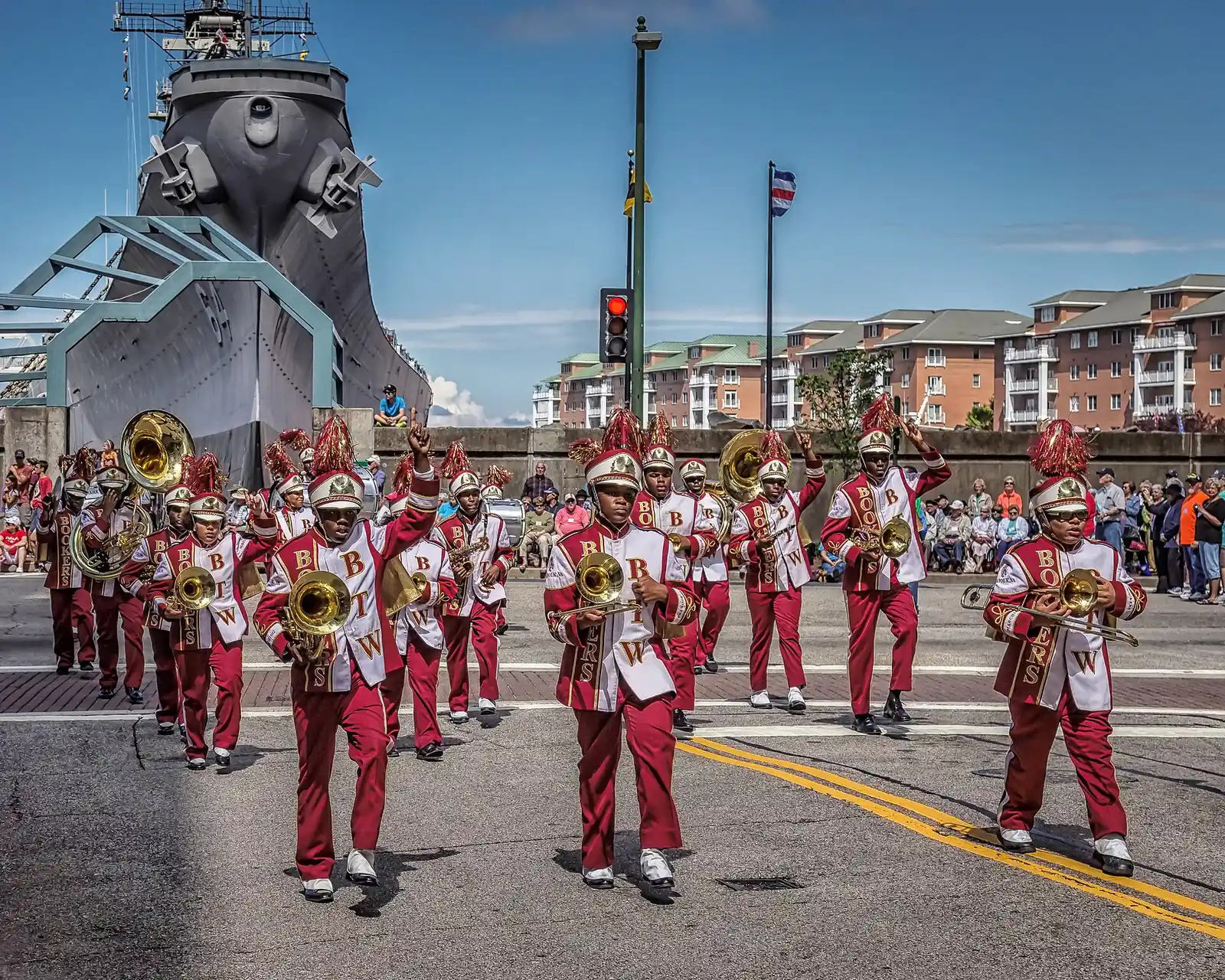 Booker T. Washington High School's marching band passes the battleship Wisconsin in the Norfolk NATO Festival parade downtown.