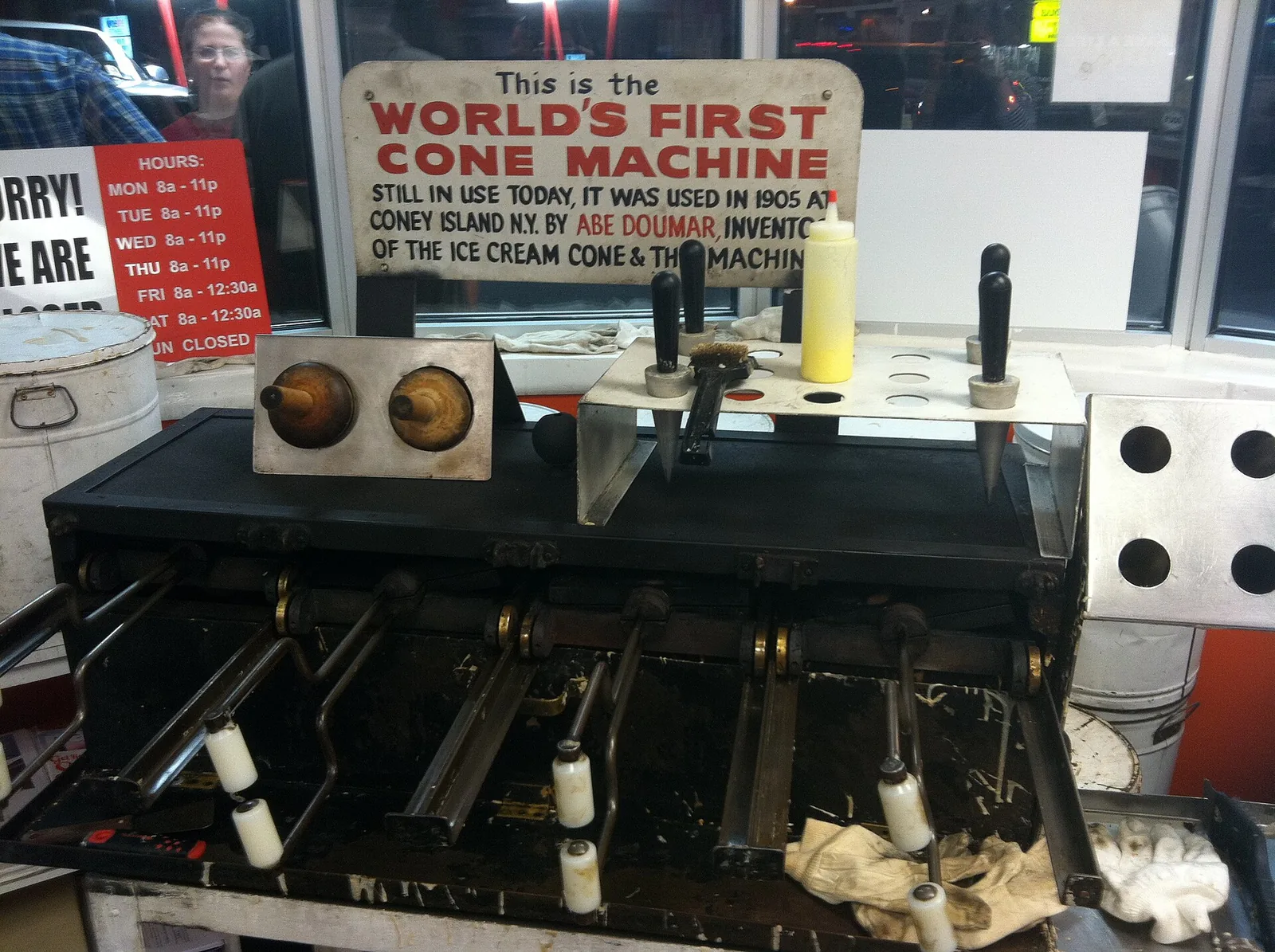 The ice cream cone machine at Doumar's on Monticello Avenue in Norfolk. The hours sign in the photo is old; the table below has the current hours.