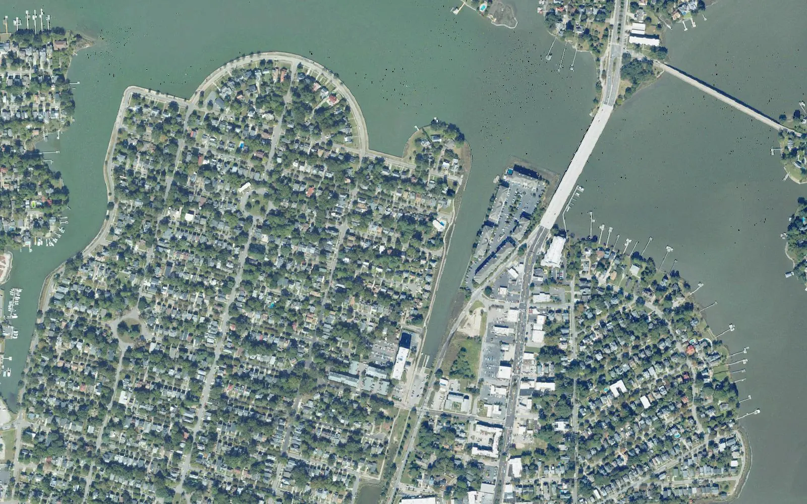 Aerial view of Colonial Place on its peninsula in the Lafayette River, with the Granby Street bridge and Riverview to the right.