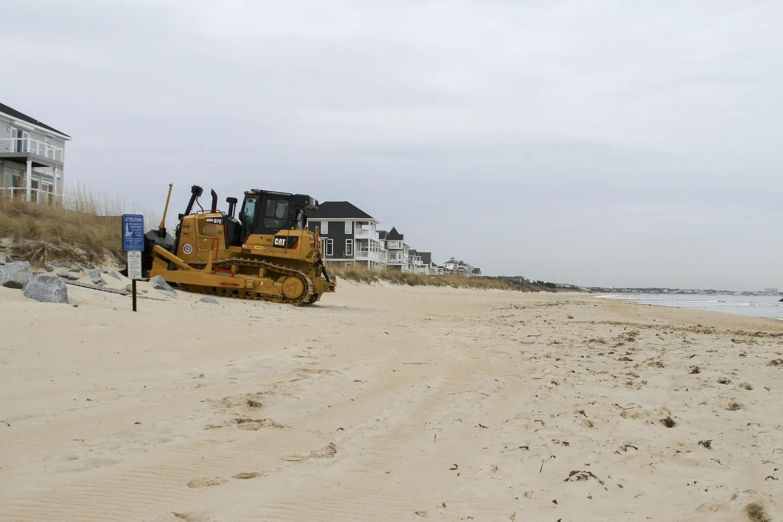 Heavy equipment staged on the beach in East Ocean View, Norfolk, for an Army Corps of Engineers beach-widening project in February 2017.