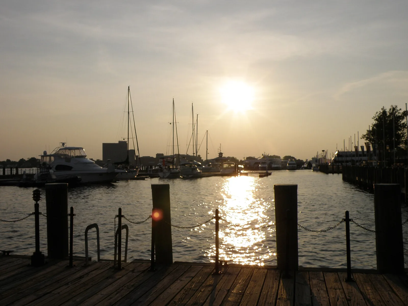 Boats in the marina at Waterside on the Elizabeth River in downtown Norfolk at sunset.