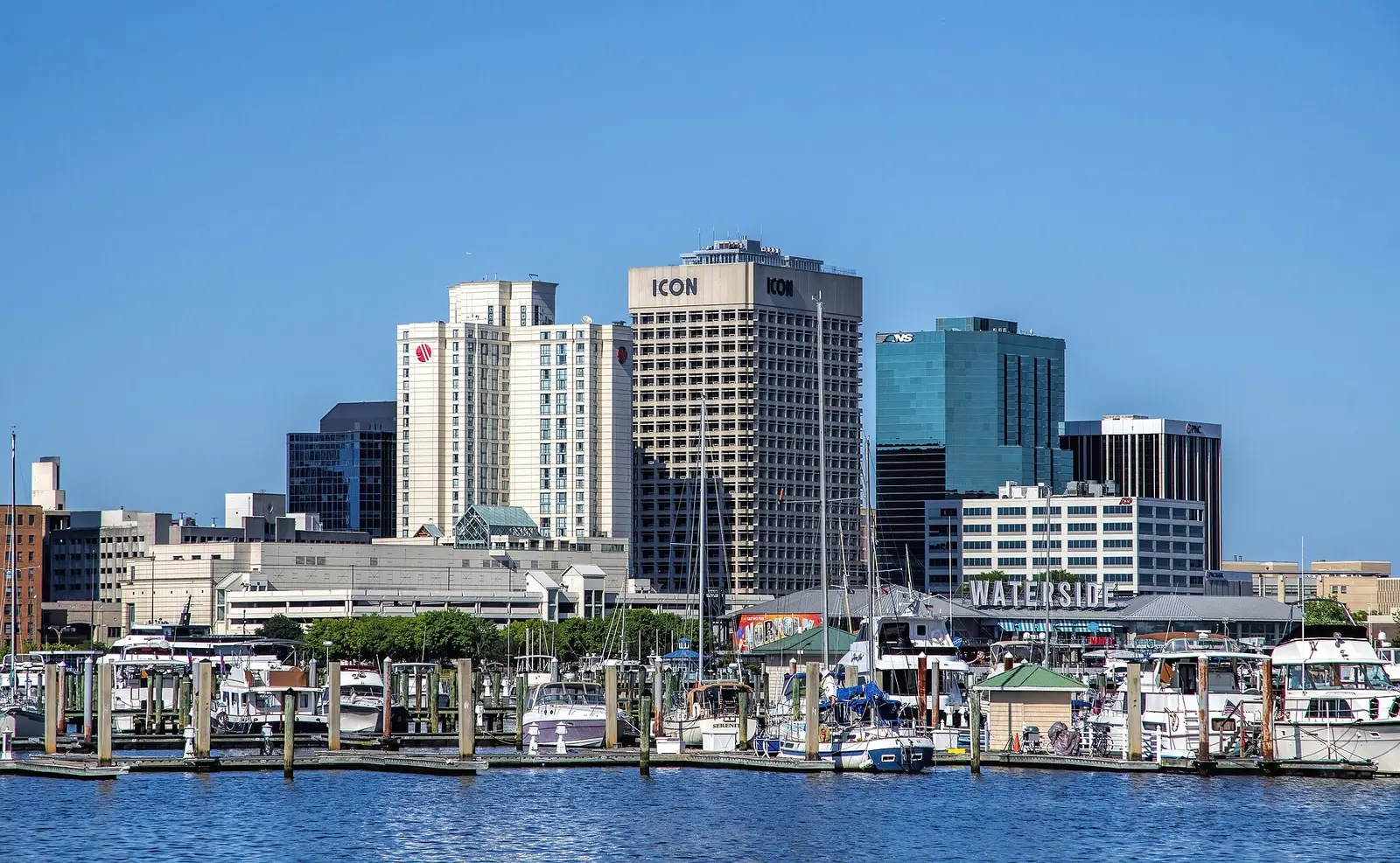 Downtown Norfolk's towers and the Waterside District behind the boats of the downtown marina on the Elizabeth River.