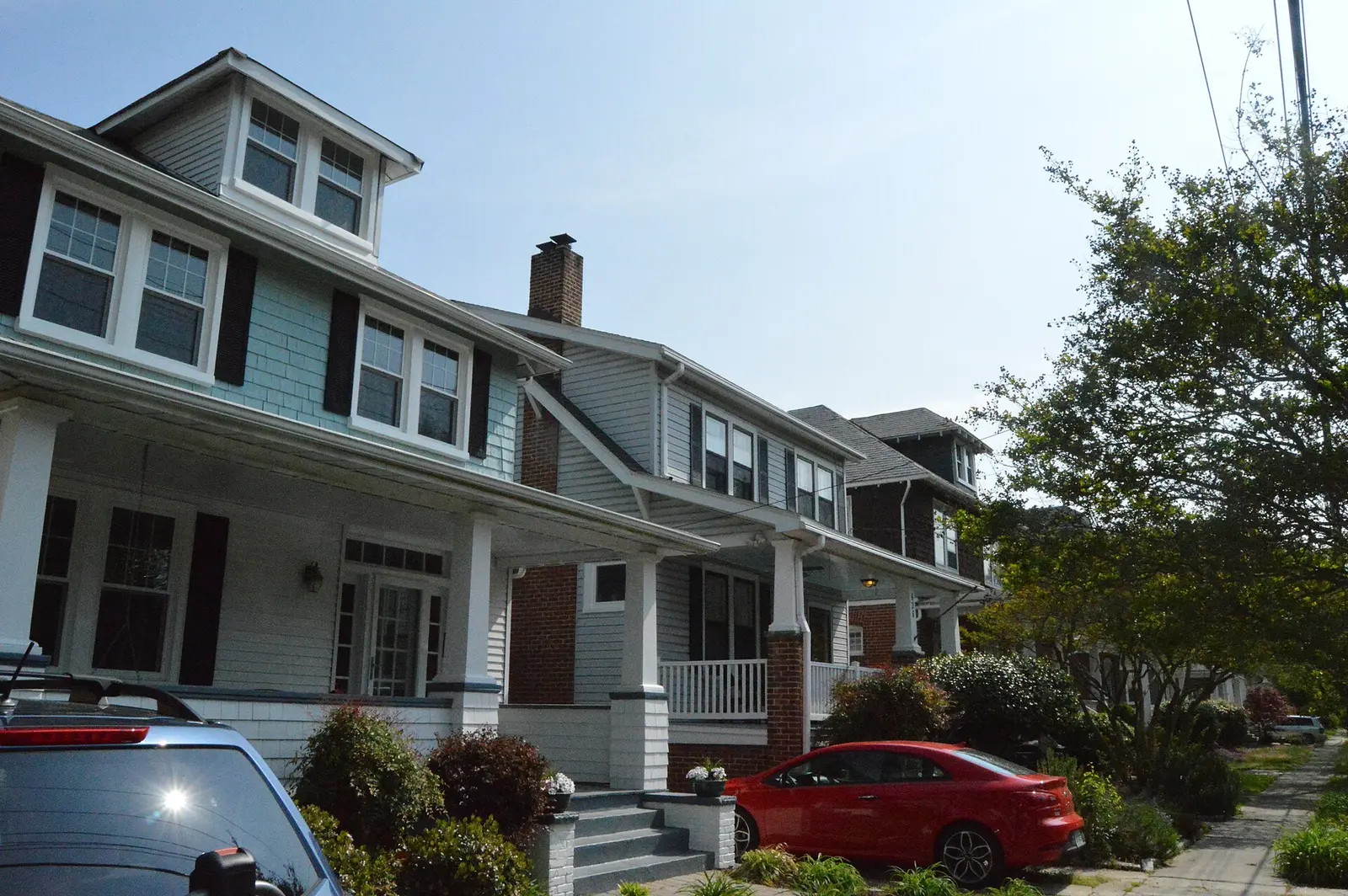 Porches and gabled houses on Delaware Avenue, one of Norfolk's older residential streets.