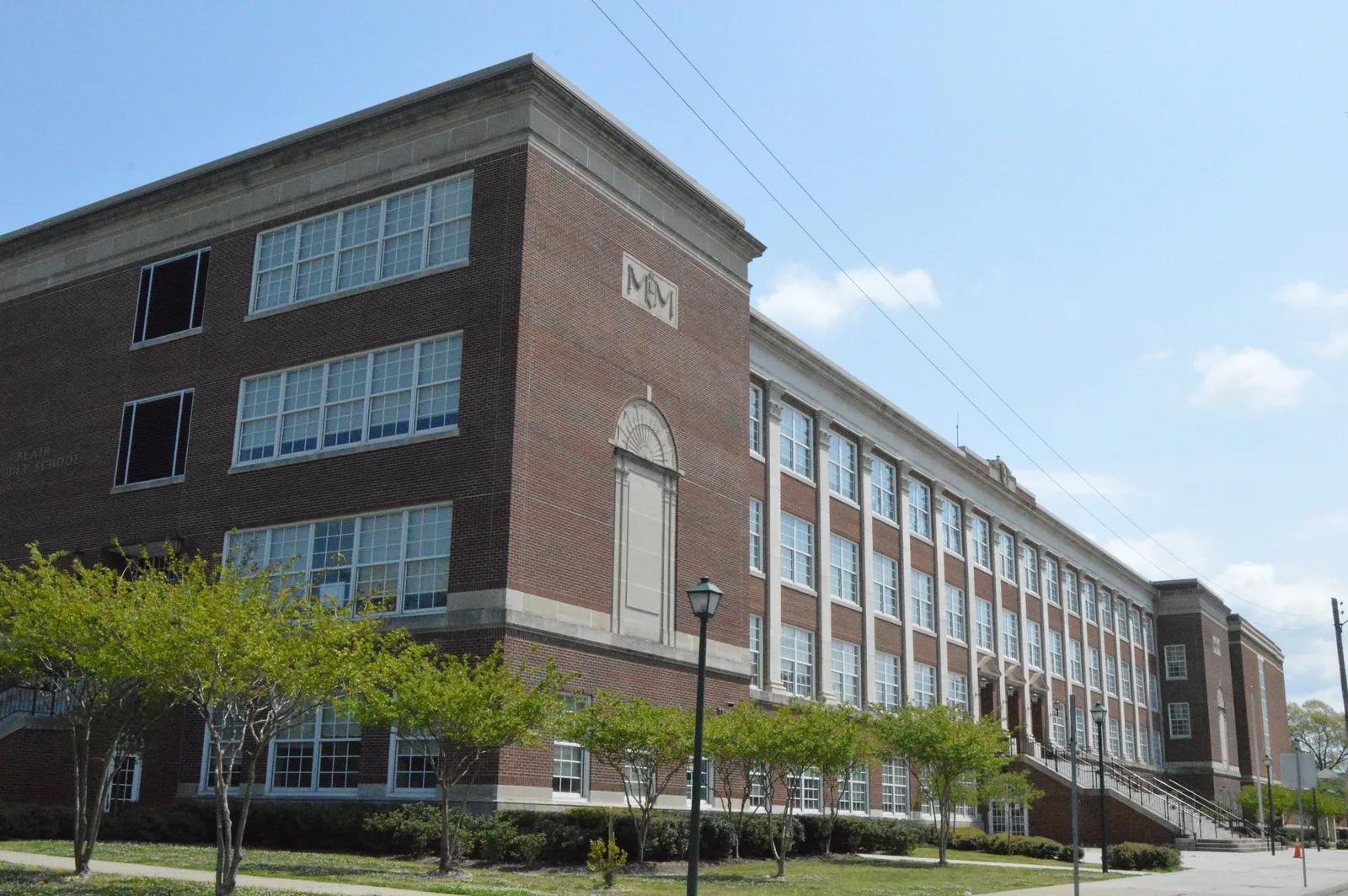 The front of the 1921 James Blair Junior High School building, now Blair Middle School, at 730 Spotswood Ave.