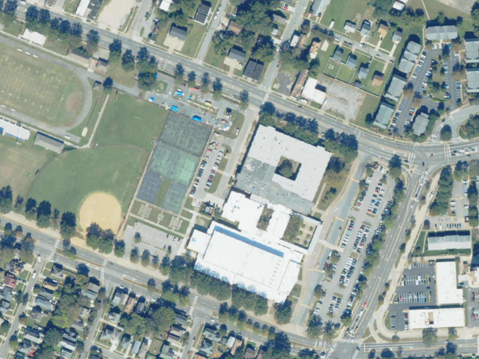 Booker T. Washington High School and its grounds, center, from the air in October 2023.