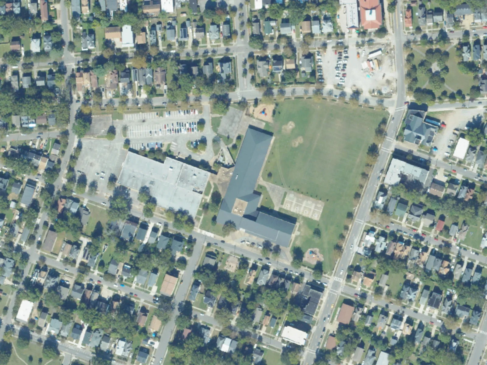 James Monroe Elementary School and its grounds, center, from the air in October 2023.