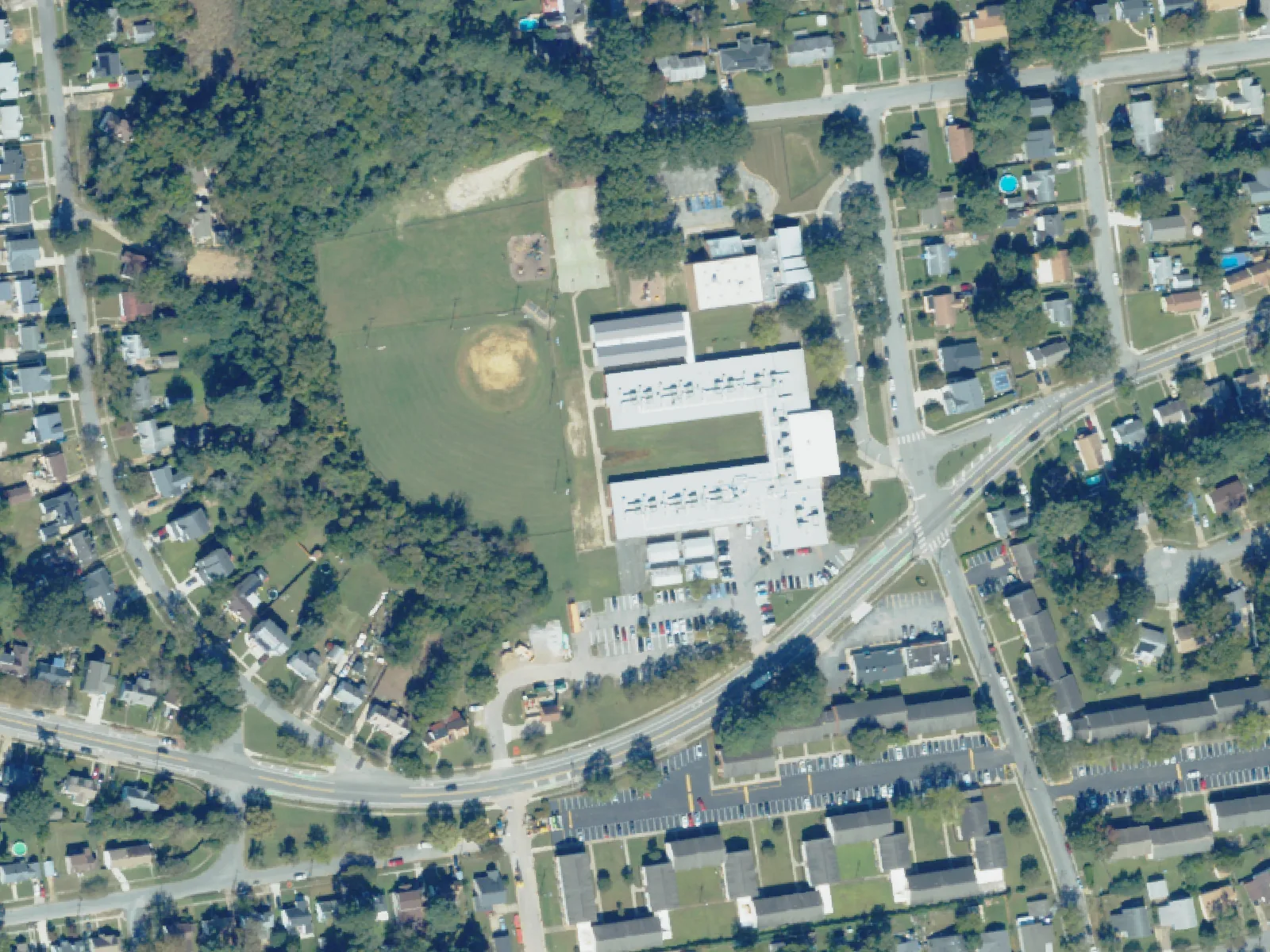 Sherwood Forest Elementary School and its grounds, center, from the air in October 2023.