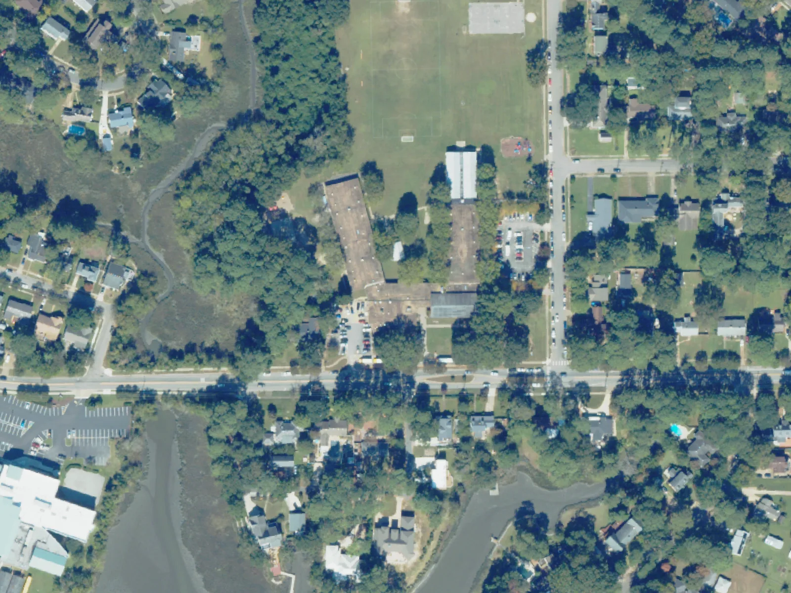 Suburban Park Elementary School and its grounds, center, from the air in October 2023.