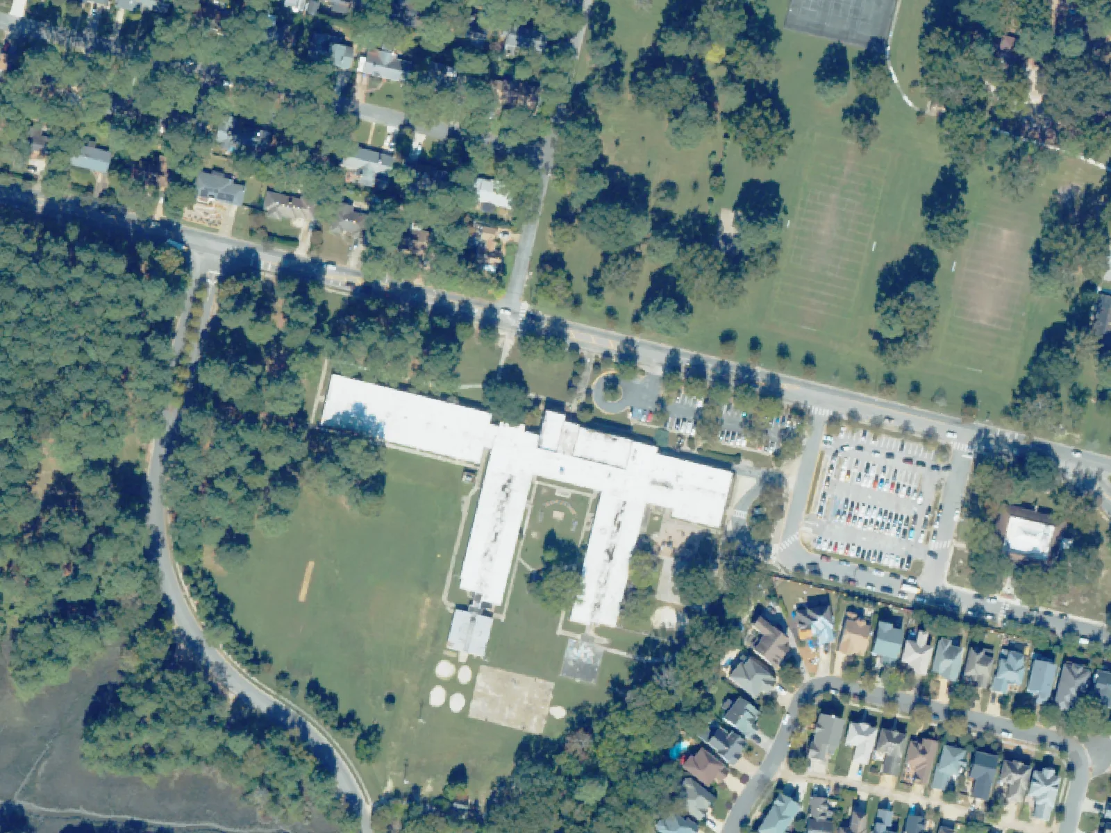 Willard Elementary School and its grounds, center, from the air in October 2023.