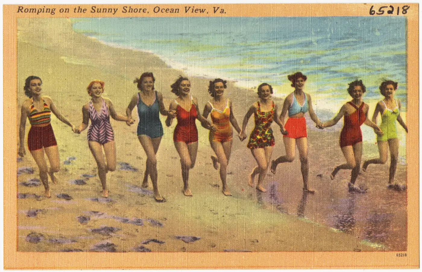 A vintage linen postcard of children playing on the beach at Ocean View, Norfolk's Chesapeake Bay shore.